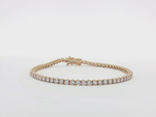 Load and play video in Gallery viewer, 4.00ct Lab Grown Four Claw Tennis Bracelet in 9k Gold
