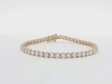 Load and play video in Gallery viewer, 8.00ct Lab Grown Four Claw Tennis Bracelet in 18k Gold
