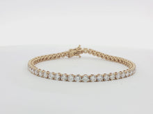 Load and play video in Gallery viewer, 7.00ct Lab Grown Four Claw Tennis Bracelet in 18k Gold
