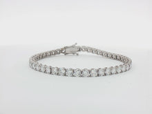 Load and play video in Gallery viewer, 10.00ct Lab Grown Four Claw Tennis Bracelet in 9k Gold
