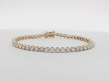 Load and play video in Gallery viewer, 3.00ct Lab Grown Crown Set Tennis Bracelet in 9k Gold
