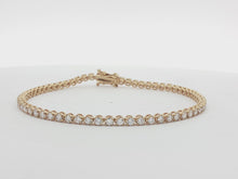 Load and play video in Gallery viewer, 2.00ct Lab Grown Crown Set Tennis Bracelet in 18k Gold
