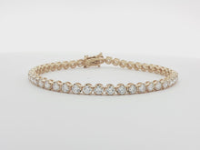 Load and play video in Gallery viewer, 5.00ct Lab Grown Crown Set Tennis Bracelet in 18k Gold
