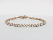 Load and play video in Gallery viewer, 4.00ct Lab Grown Crown Set Tennis Bracelet in 9k Gold
