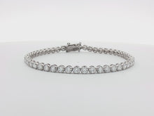 Load and play video in Gallery viewer, 4.00ct Lab Grown Crown Set Tennis Bracelet in 9k Gold
