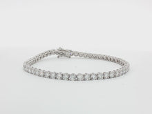 Load and play video in Gallery viewer, 7.00ct Lab Grown Four Claw Tennis Bracelet in 9k Gold
