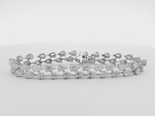 Load and play video in Gallery viewer, 12.00ct Double Row Lab Grown Pear Shape Tennis Bracelet in 14k Gold
